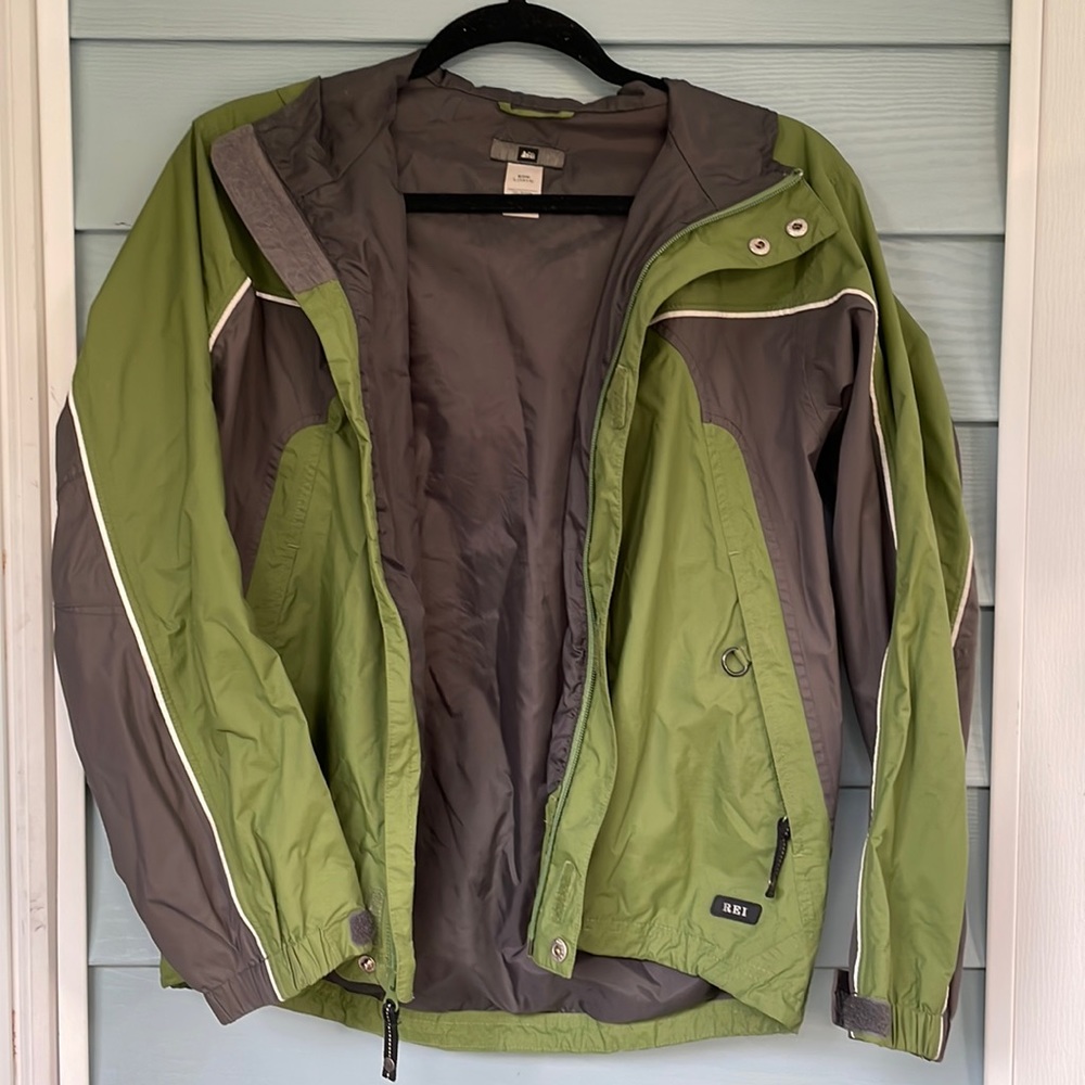 REI gently used children’s raincoat. Army green and gray.